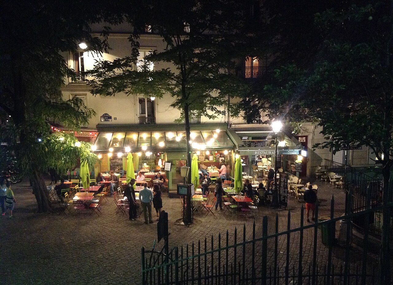 A café terrace beside the steps of rue Paul-Albert in Montmartre